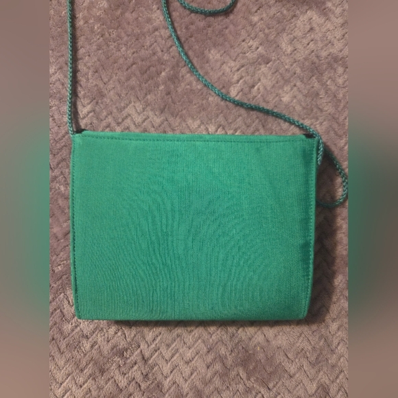 Elegant Green Canvas Handbag with Black Accents - Picture 8 of 8